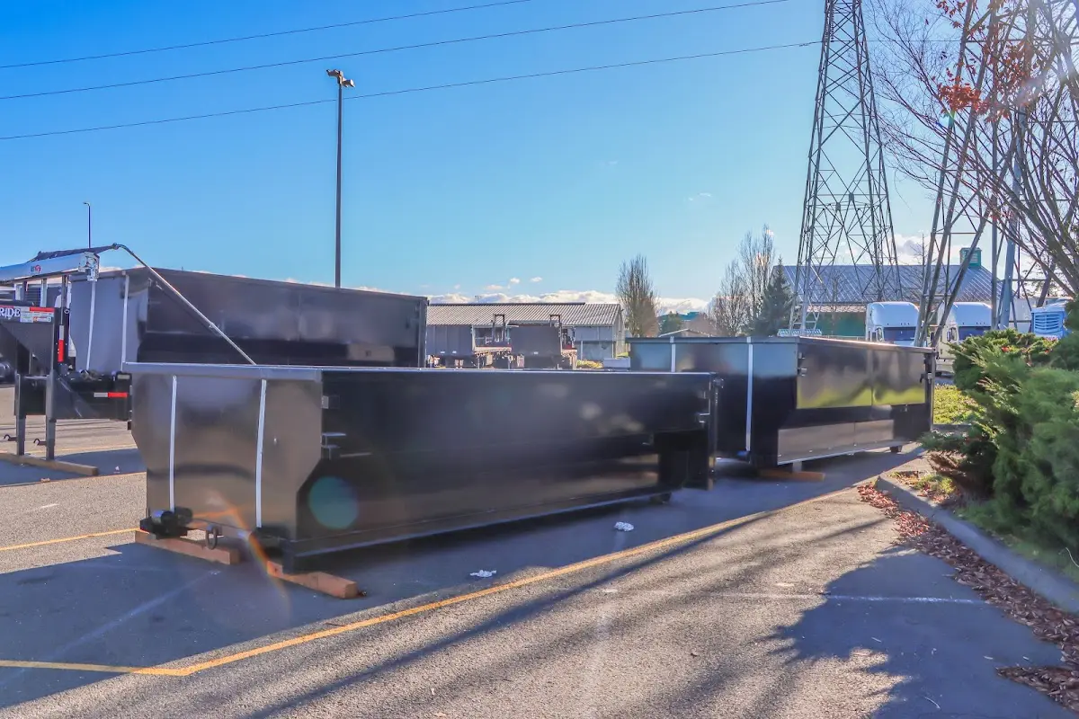 Roll-off dumpster ready for waste disposal at job site for 2 Yard Dumpster Rental in White House